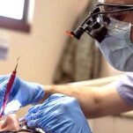 Dentist carrying out procedure