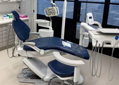 Dental surgery room with chair and equipment