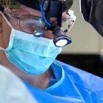 Surgeon wearing vision aid