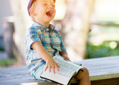 child with book