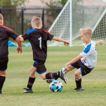 children playing football