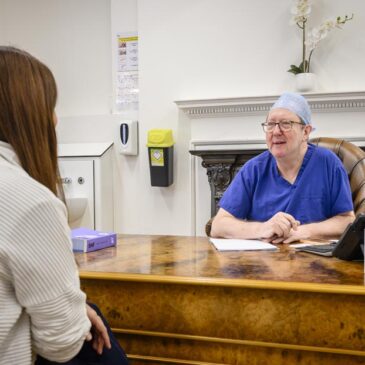 dermatology consultant with patient