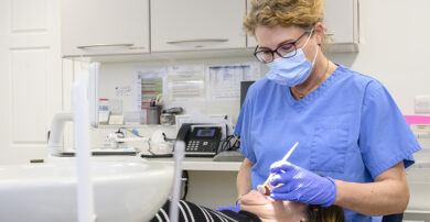 Orthodontist treating patient