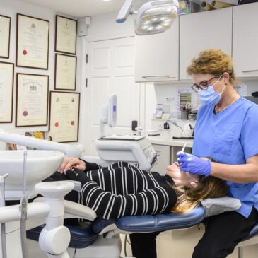 Orthodontist treating patient