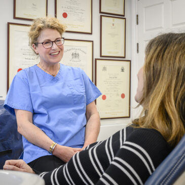 orthodontist talking with patient