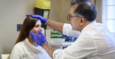 maxillofacial consultant Professor Kaveh Shakib with patient